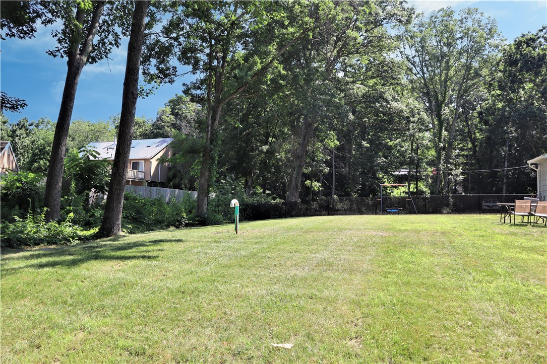 50 Colvintown Road Coventry, RI 02816 - Photo 4 of 29 The Yard is Awesome! It Has a Fenced in Area and Will Accommodate All of Your Outdoor Needs!