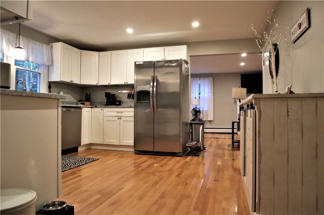 50 Colvintown Road Coventry, RI 02816 - Photo 8 of 29 New Kitchen Cabinets with Granite Counter Tops & Stainless-Steel Appliances, Gleaming Hardwood Floors Throughout!