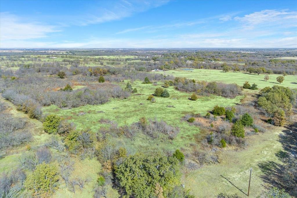 0 County Road 3315 Hubbard, TX 76648 - Photo 13 of 16 a view of a city with lush green forest