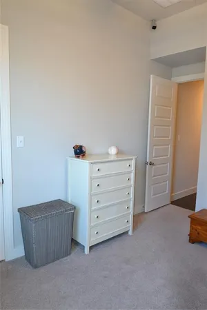 a room with furniture and a cabinet