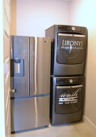 a refrigerator freezer sitting in a kitchen