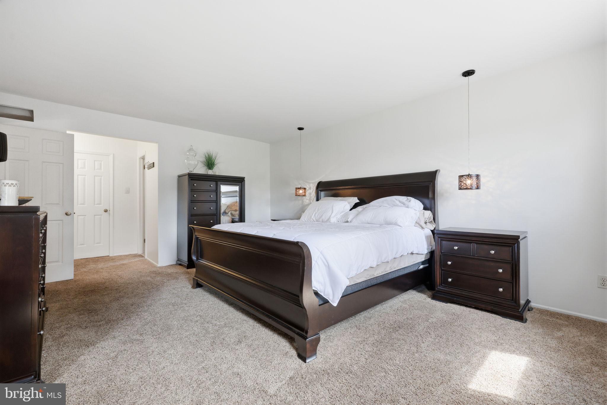 1140 Charter Road Warminster, PA 18974 - Photo 19 of 37 Spacious bedroom with modern elegance.