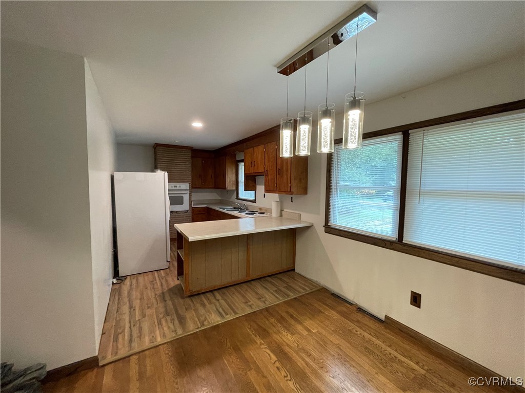 2806 Trarich Road Petersburg, VA 23805 - Photo 11 of 14 Kitchen featuring pendant lighting, white applianc