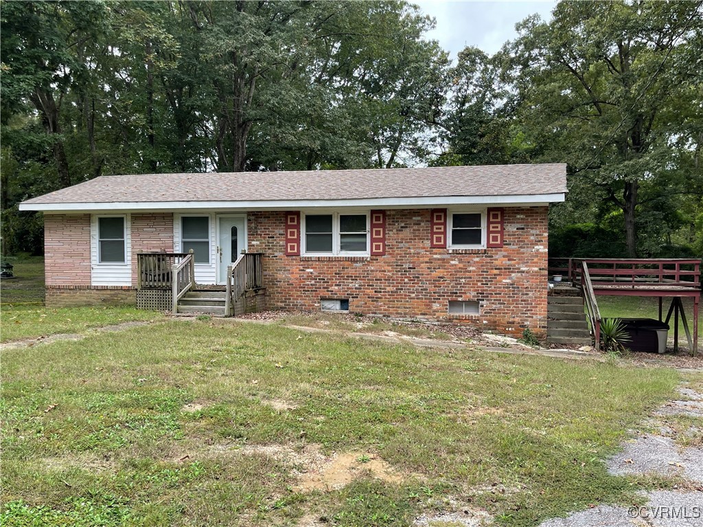 2806 Trarich Road Petersburg, VA 23805 - Photo 2 of 14 View of front of home with a front lawn and a wood