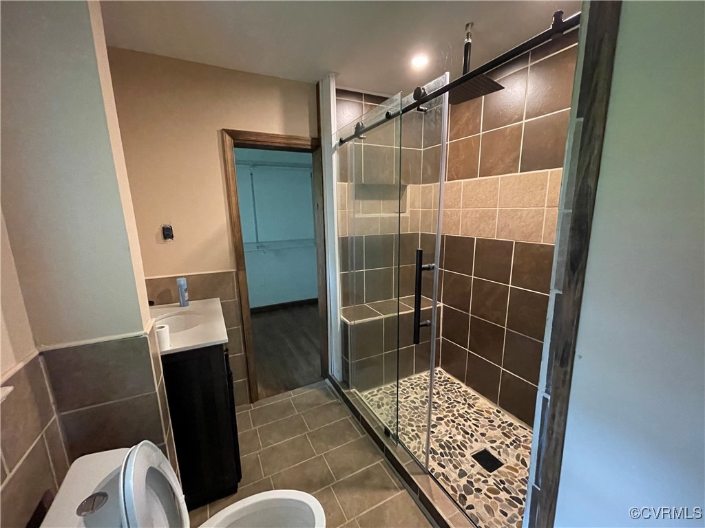 2806 Trarich Road Petersburg, VA 23805 - Photo 5 of 14 Bathroom with tile walls, vanity, walk in shower,