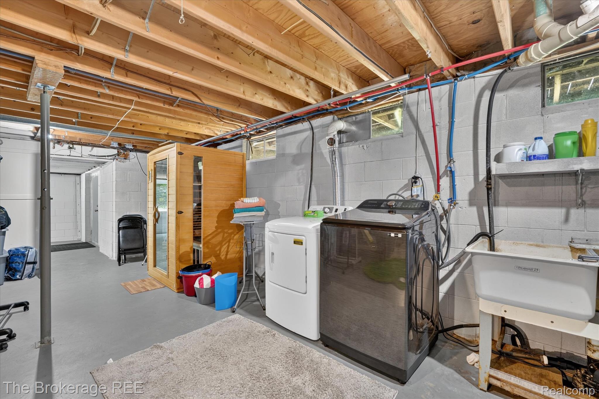 13269 North Genesee Road Clio, MI 48420 - Photo 44 of 67 Basement utility area featuring exposed wood joists and block walls