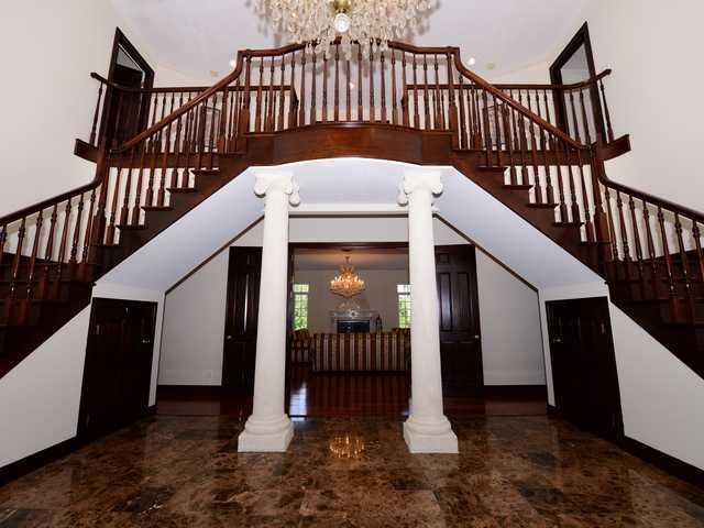 19101 Southeast Crosswinds Road Jupiter, FL 33478 - Photo 3 of 16 foyer, dbl stair 19101.jpg