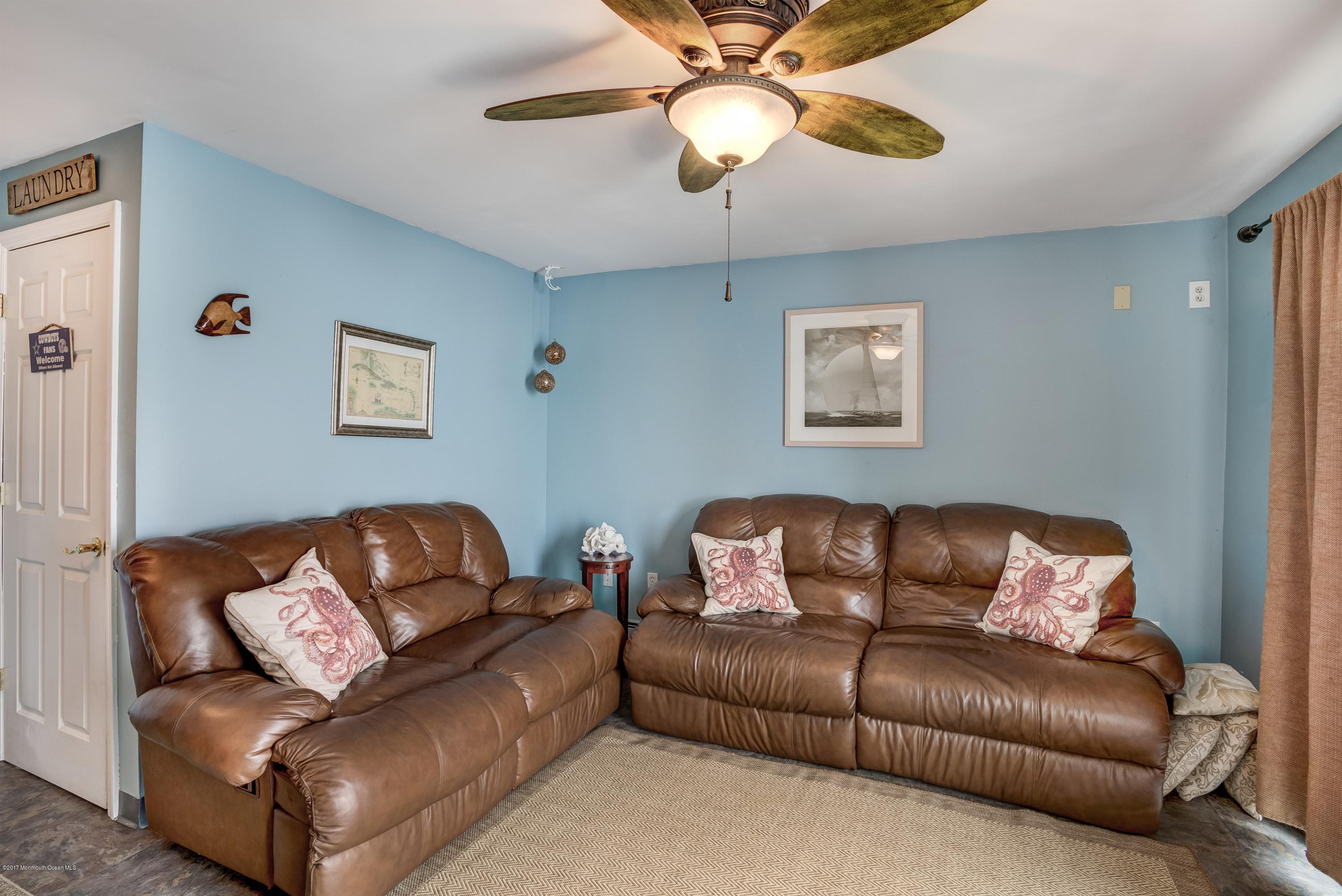 401 Stone Road Union Beach, NJ 07735 - Photo 19 of 26 a living room with furniture