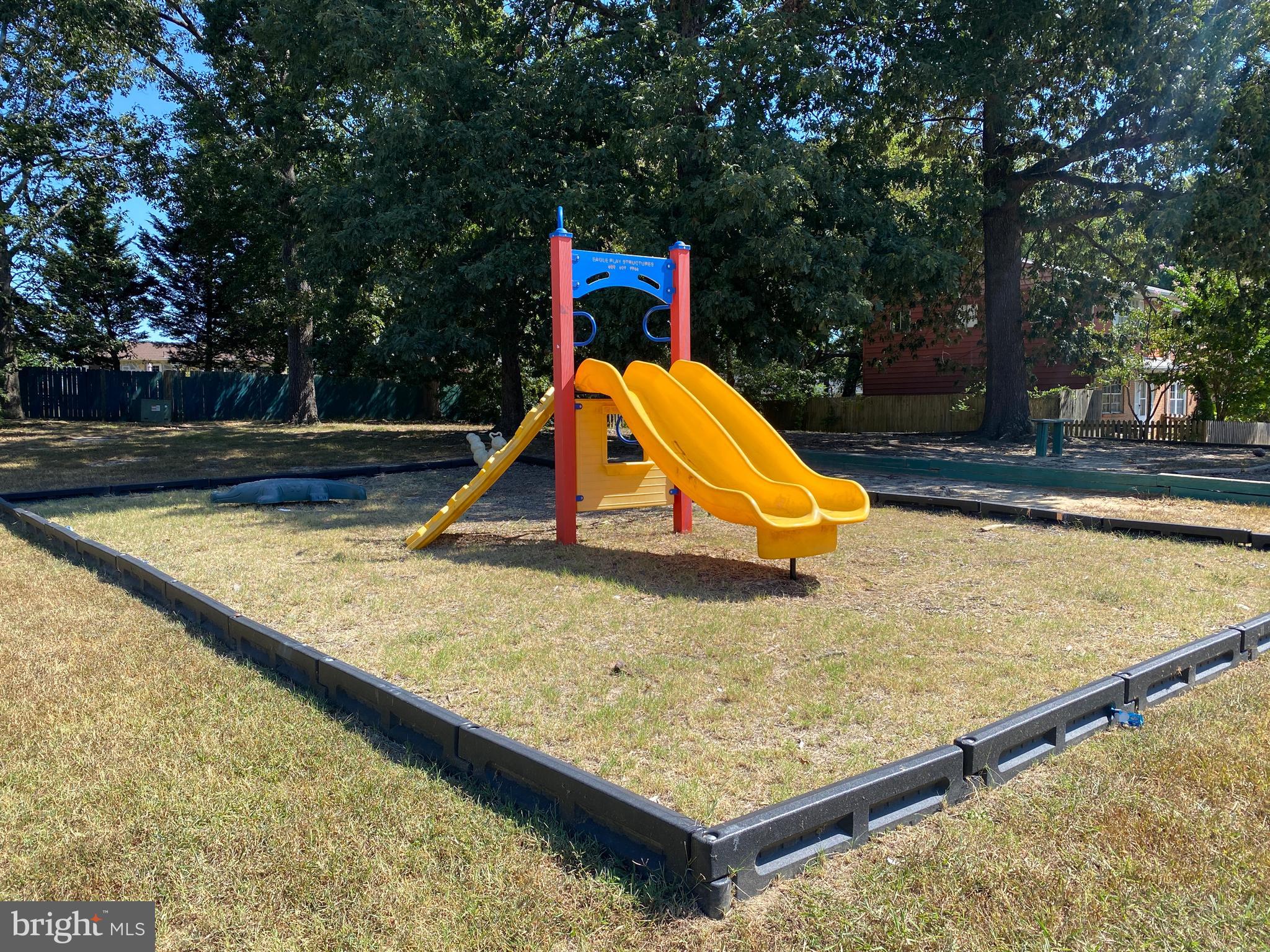 611 Anvil Road Fredericksburg, VA 22405 - Photo 20 of 29 swimming pool with a bench and trees