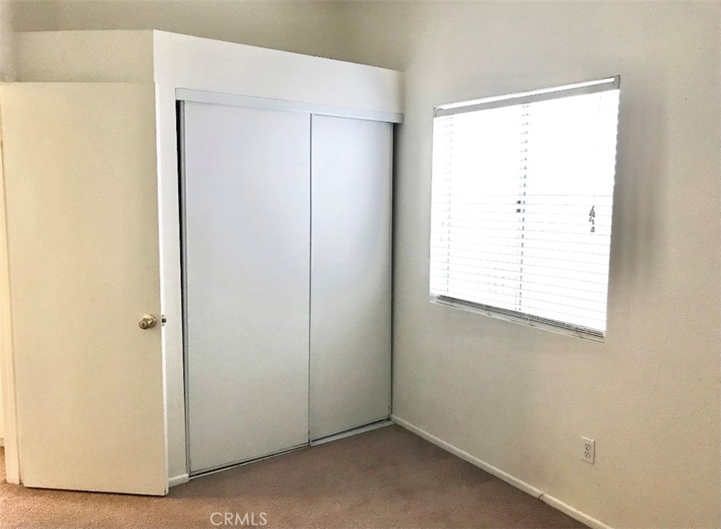 150 Elmtree Drive Perris, CA 92571 - Photo 10 of 10 a view of an empty room with a window
