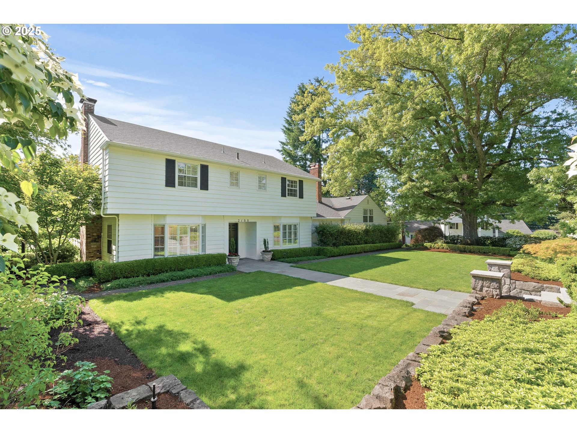 2100 Hillside Drive Lake Oswego, OR 97034 - Photo 1 of 40 a view of a yard in front of house