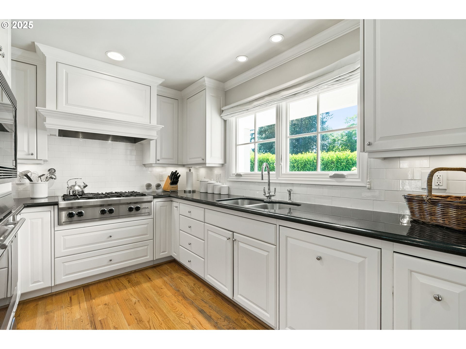 2100 Hillside Drive Lake Oswego, OR 97034 - Photo 15 of 40 a kitchen with granite countertop a sink stainless steel appliances and cabinets