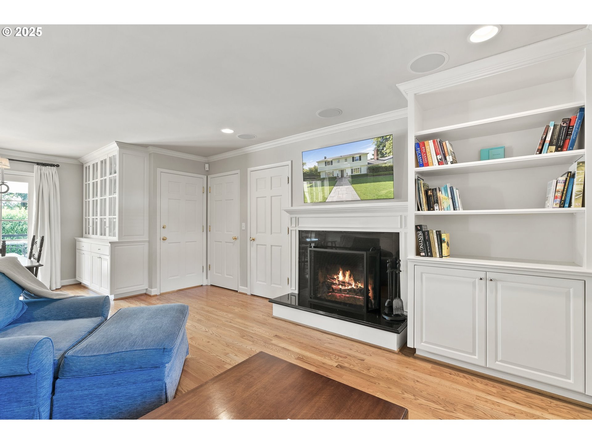 2100 Hillside Drive Lake Oswego, OR 97034 - Photo 19 of 40 a living room with furniture and a fireplace