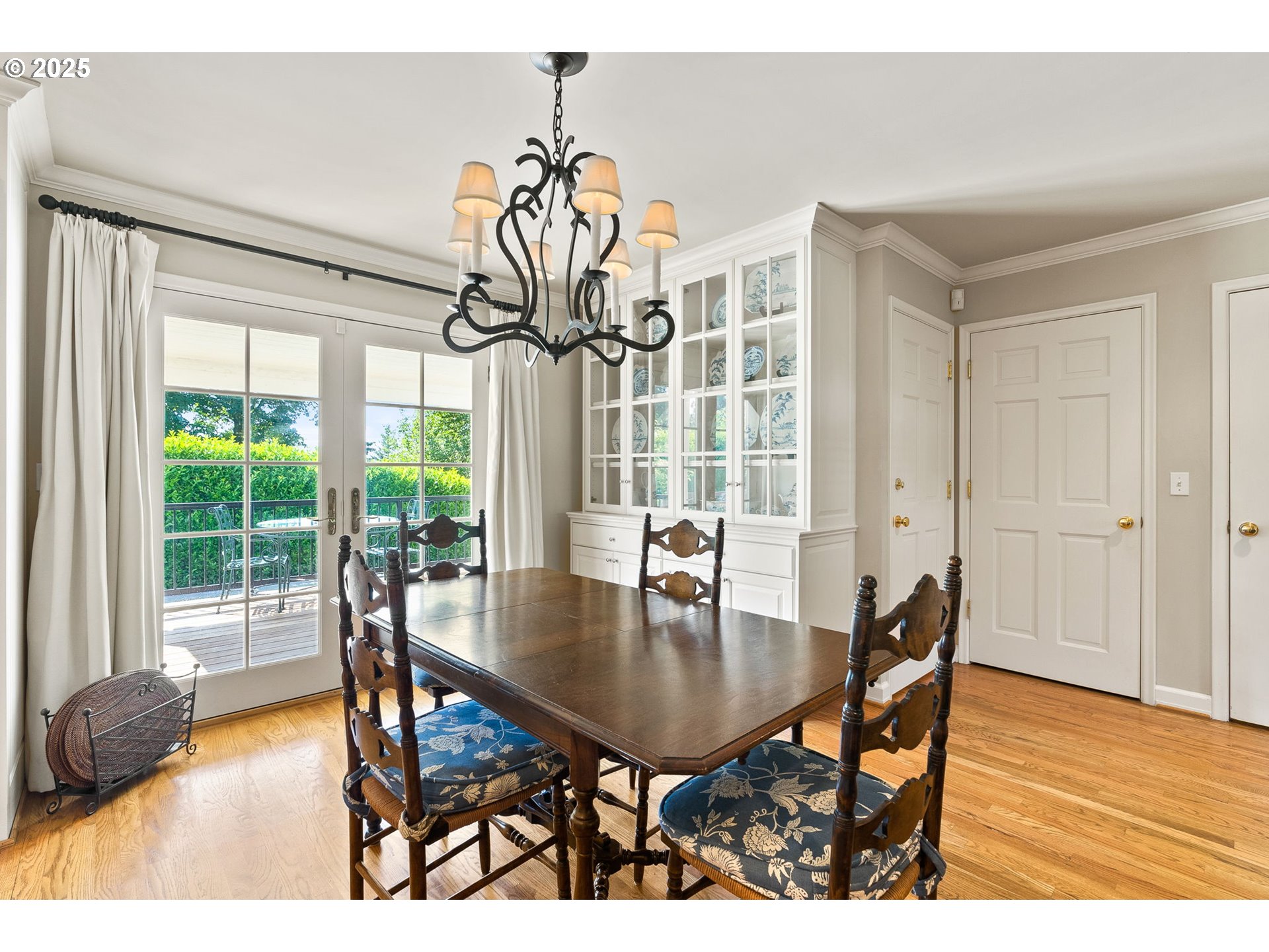 2100 Hillside Drive Lake Oswego, OR 97034 - Photo 20 of 40 a view of a dining room with furniture window and wooden floor