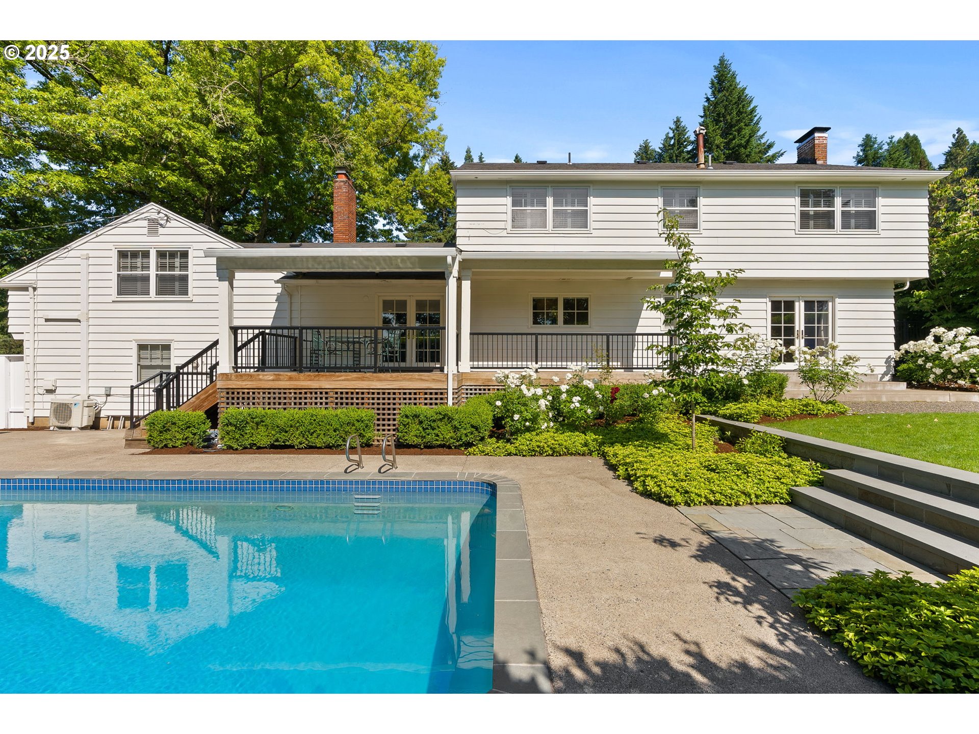 2100 Hillside Drive Lake Oswego, OR 97034 - Photo 22 of 40 a front view of a house with a yard