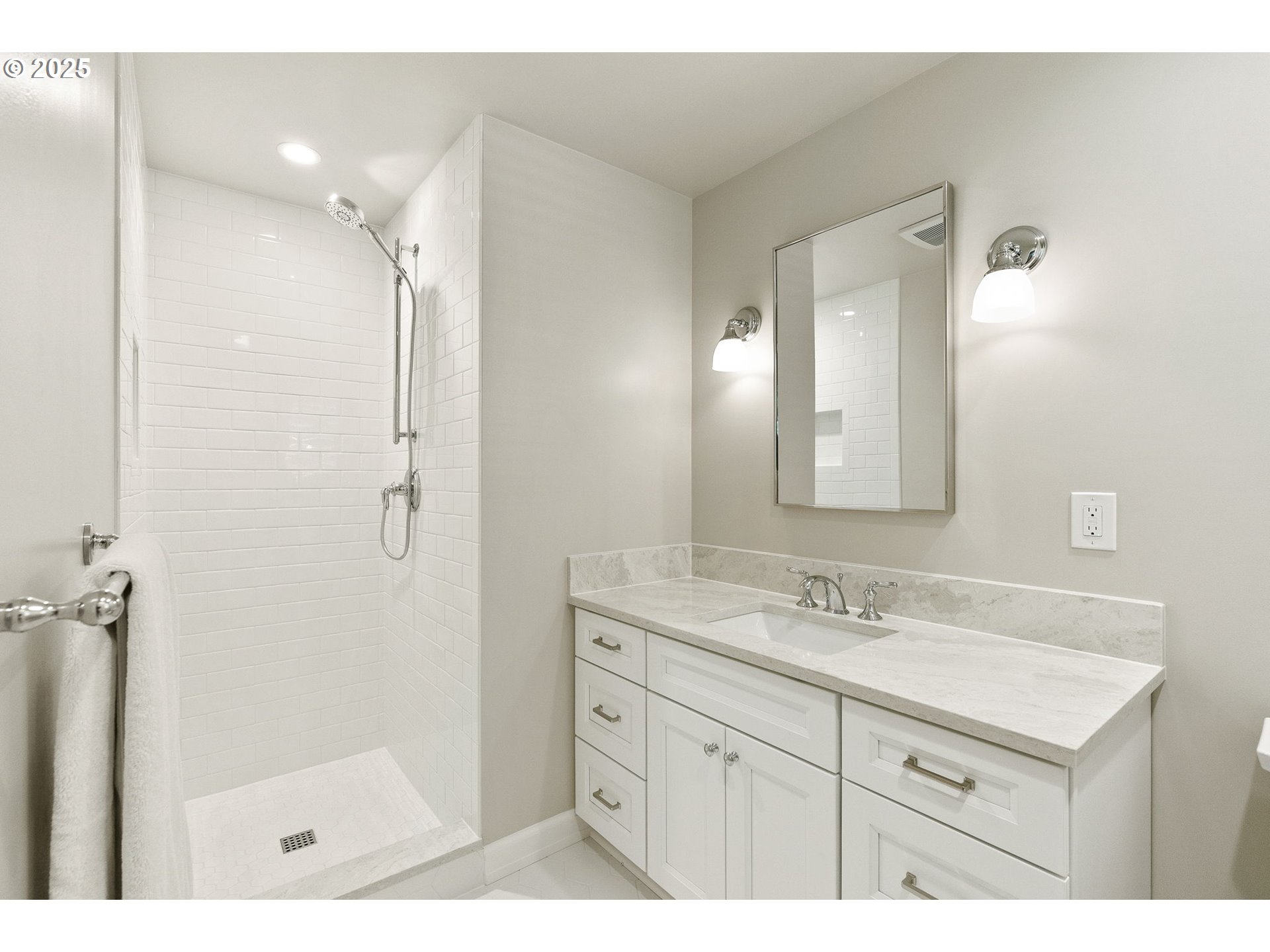 2100 Hillside Drive Lake Oswego, OR 97034 - Photo 25 of 40 a bathroom with a shower sink and mirror