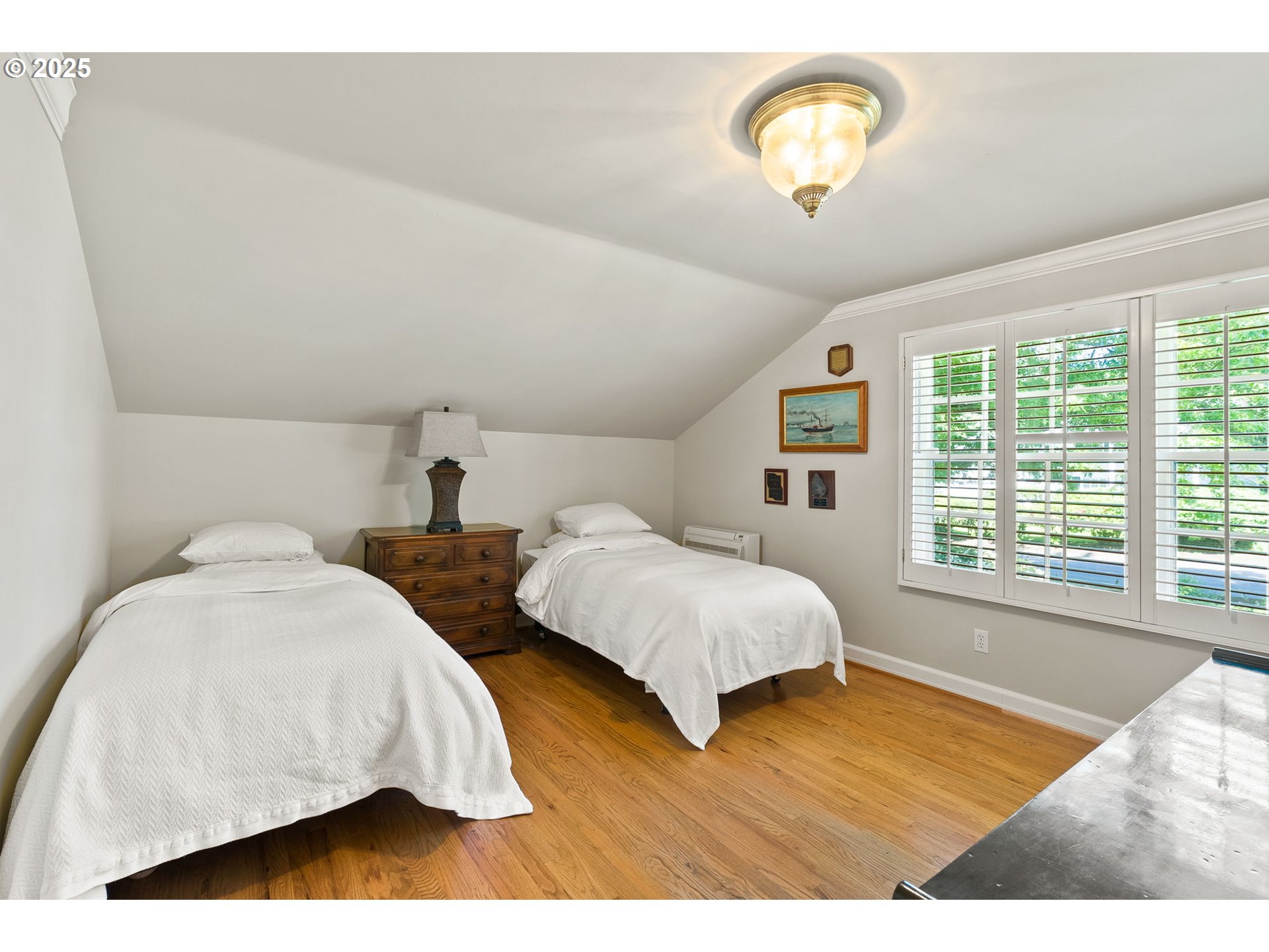 2100 Hillside Drive Lake Oswego, OR 97034 - Photo 29 of 40 a bedroom with a bed and a window