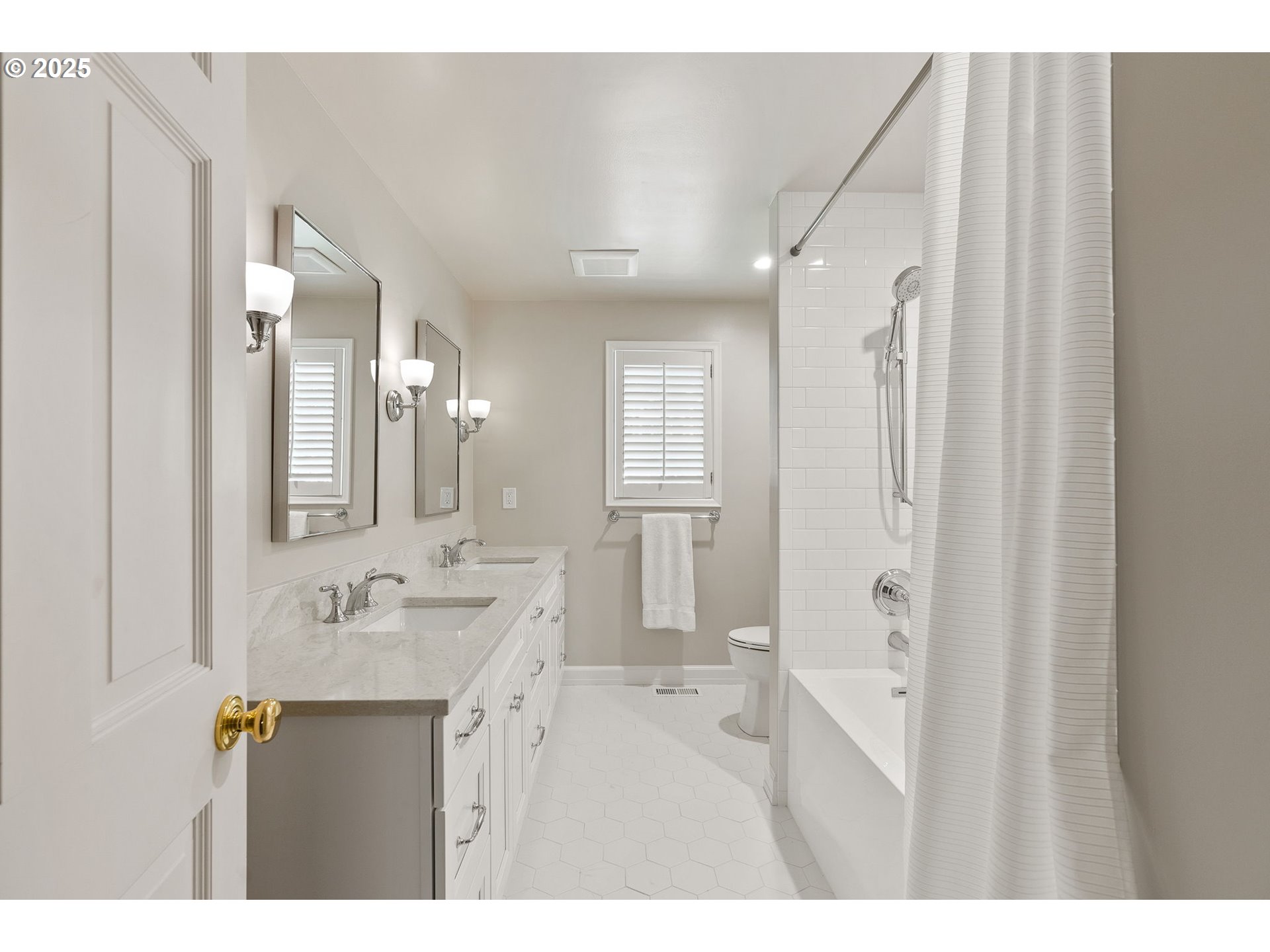 2100 Hillside Drive Lake Oswego, OR 97034 - Photo 6 of 40 a bathroom with a sink mirror and a shower