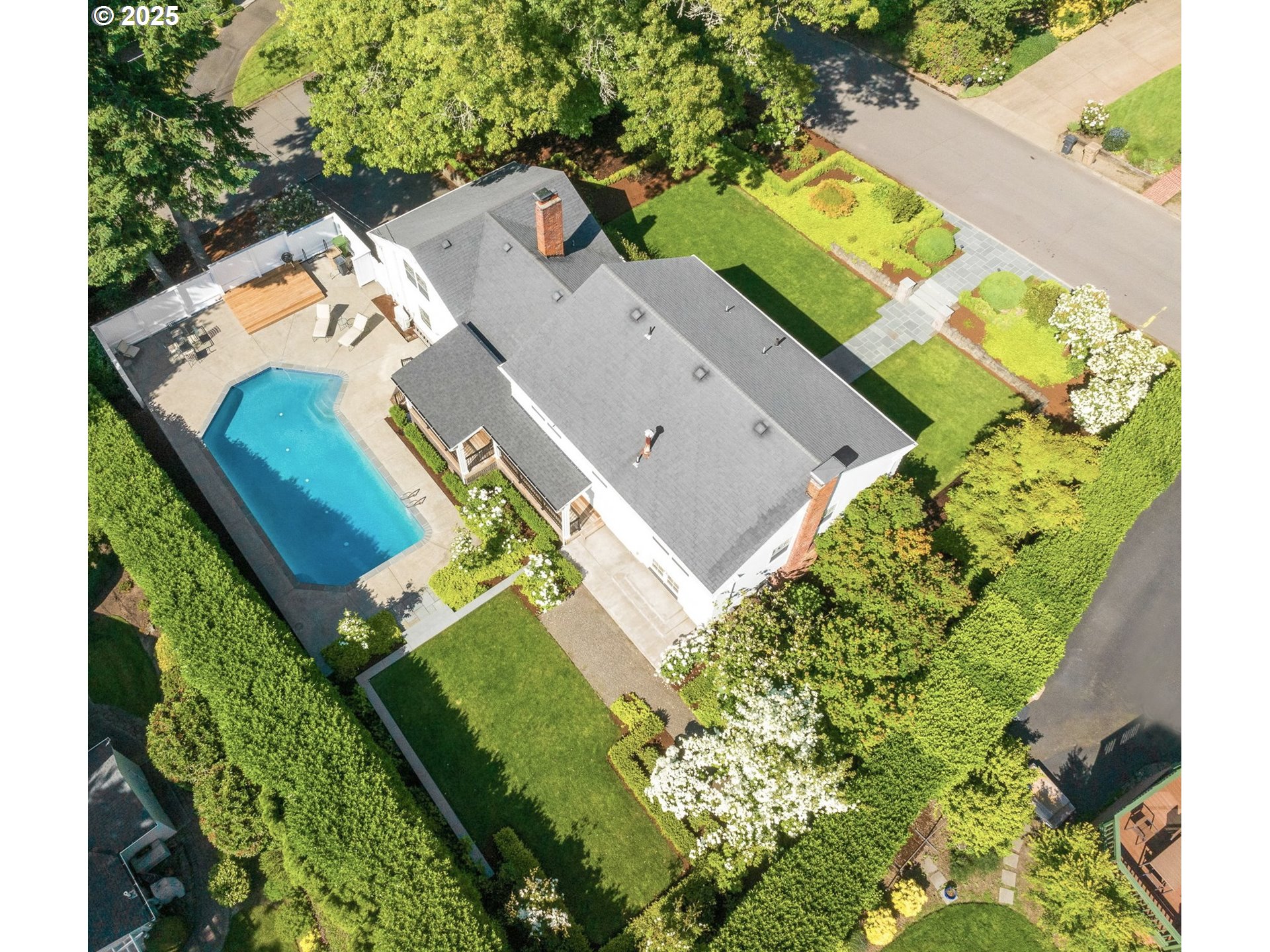 2100 Hillside Drive Lake Oswego, OR 97034 - Photo 9 of 40 an aerial view of a house with a yard and swimming pool
