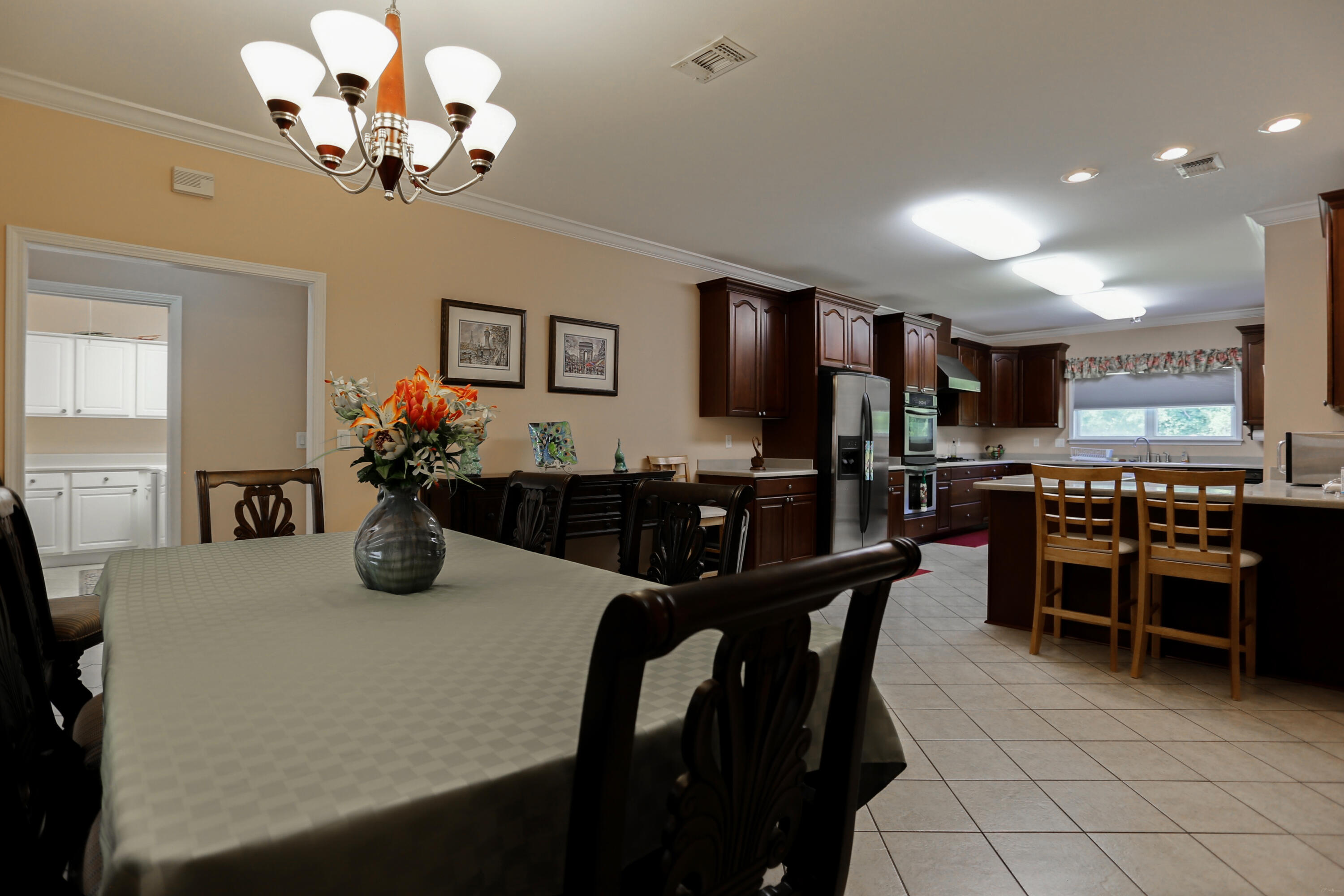 5467 Old River Road Baker, FL 32531 - Photo 26 of 55 a view of a dining room with furniture