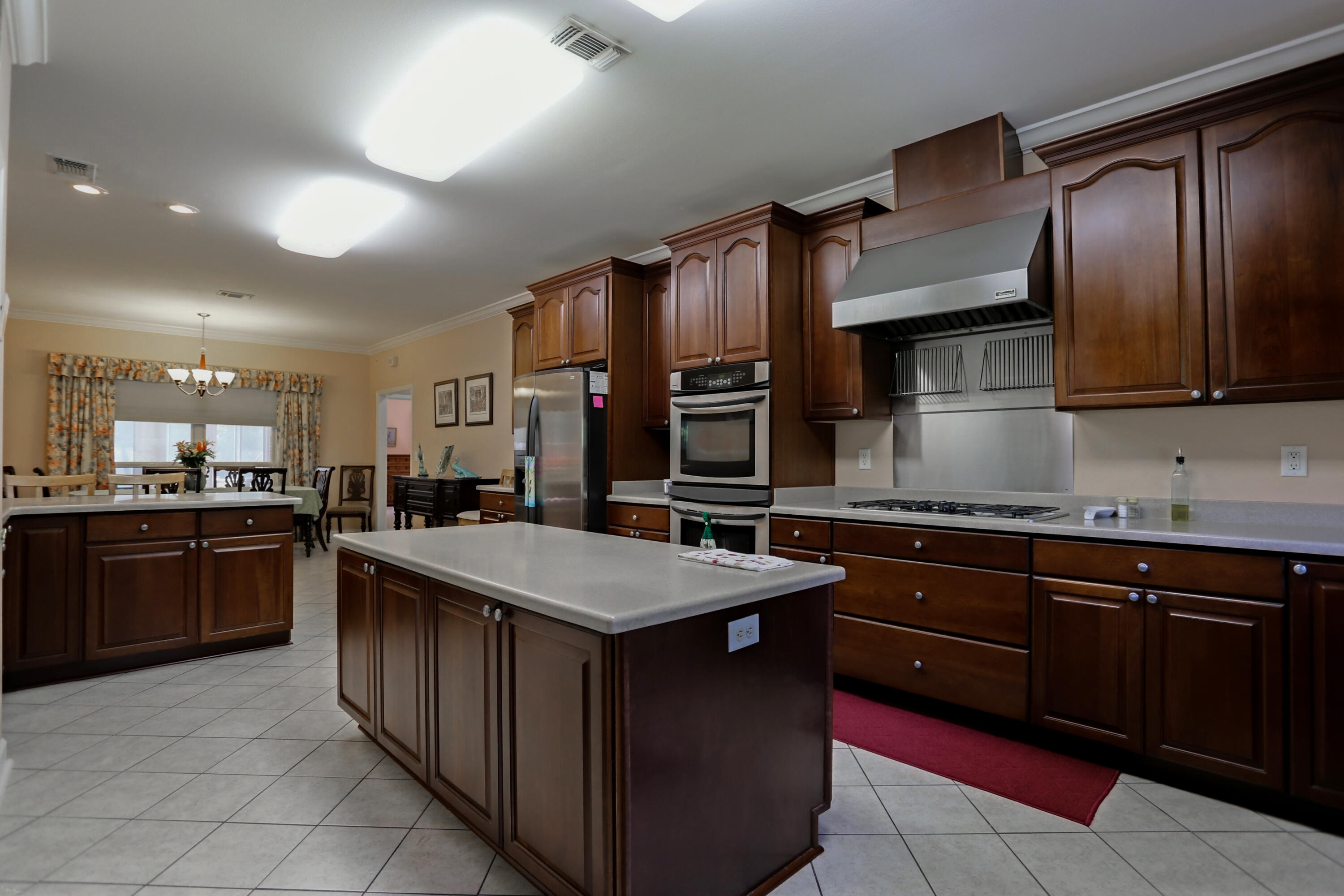5467 Old River Road Baker, FL 32531 - Photo 32 of 55 a kitchen with stainless steel appliances granite countertop a sink counter space cabinets and stainless steel appliances