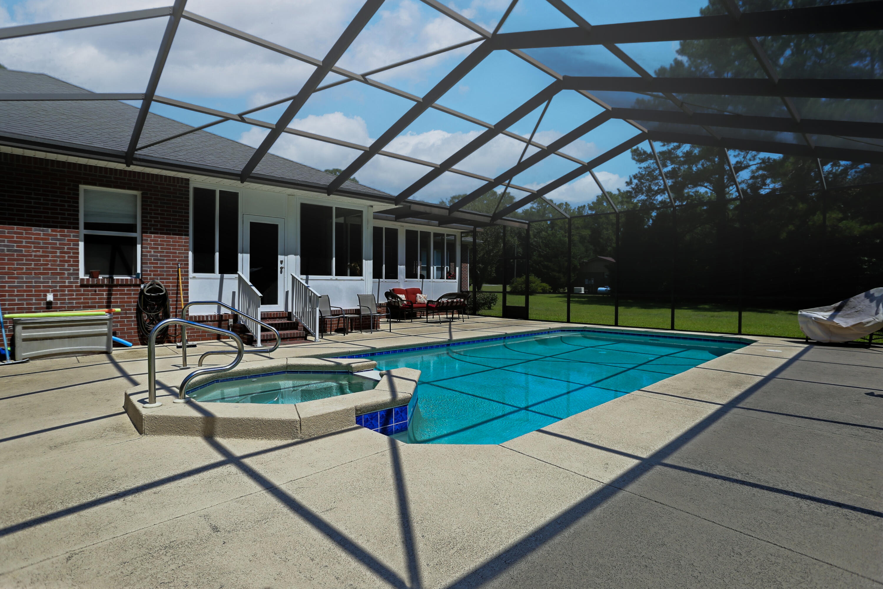 5467 Old River Road Baker, FL 32531 - Photo 46 of 55 a view of a backyard with sitting area