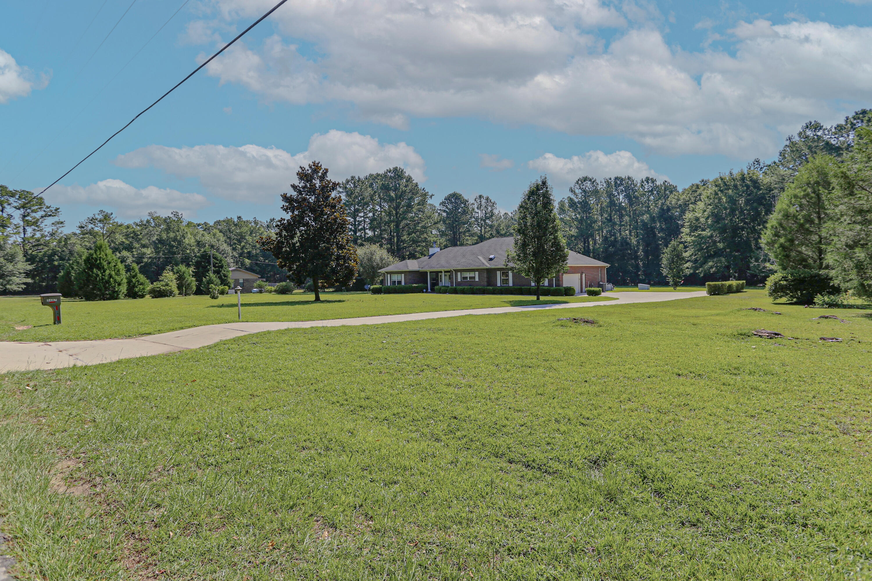 5467 Old River Road Baker, FL 32531 - Photo 5 of 55 a view of a playground with basketball court