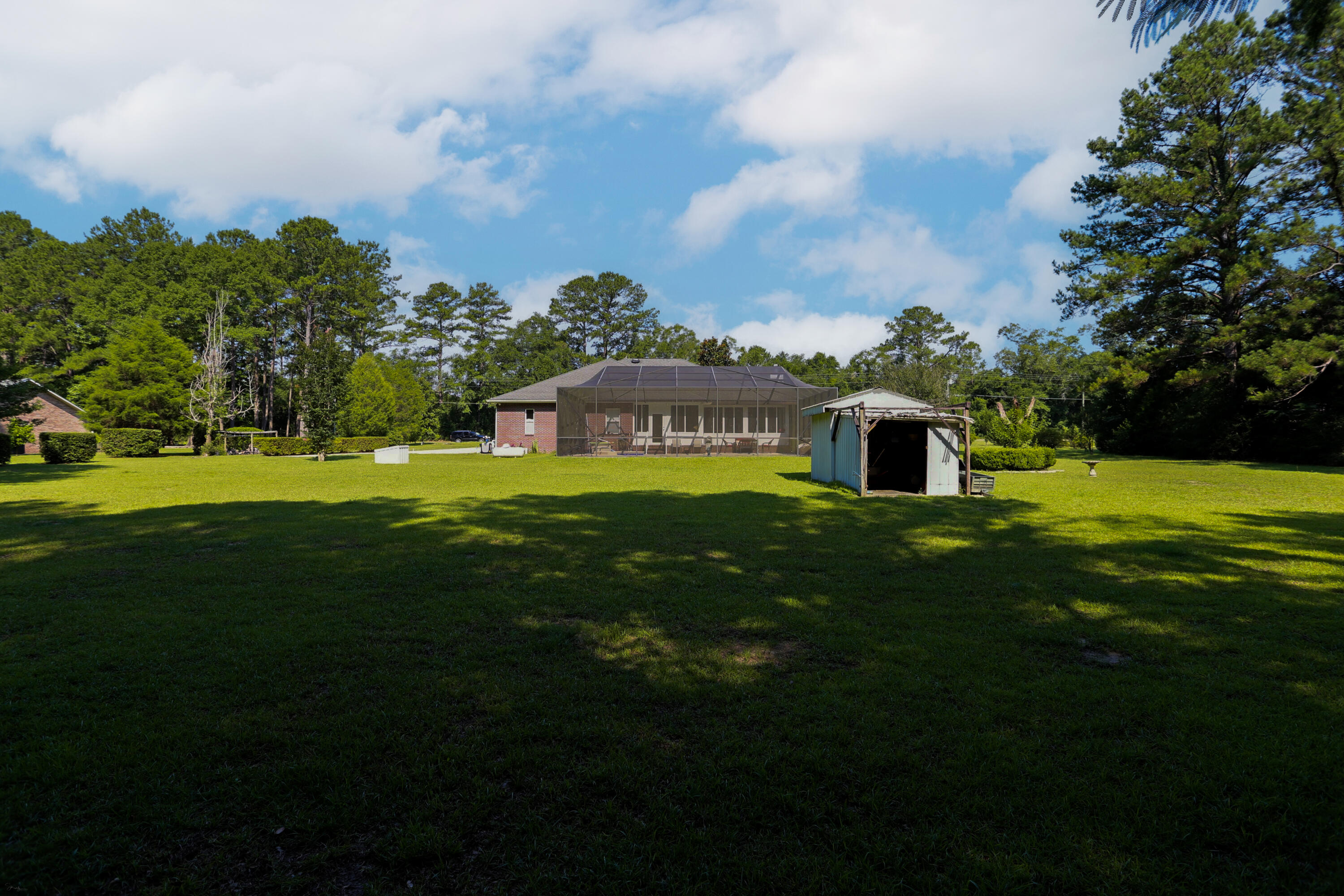 5467 Old River Road Baker, FL 32531 - Photo 53 of 55 a view of a house with a big yard