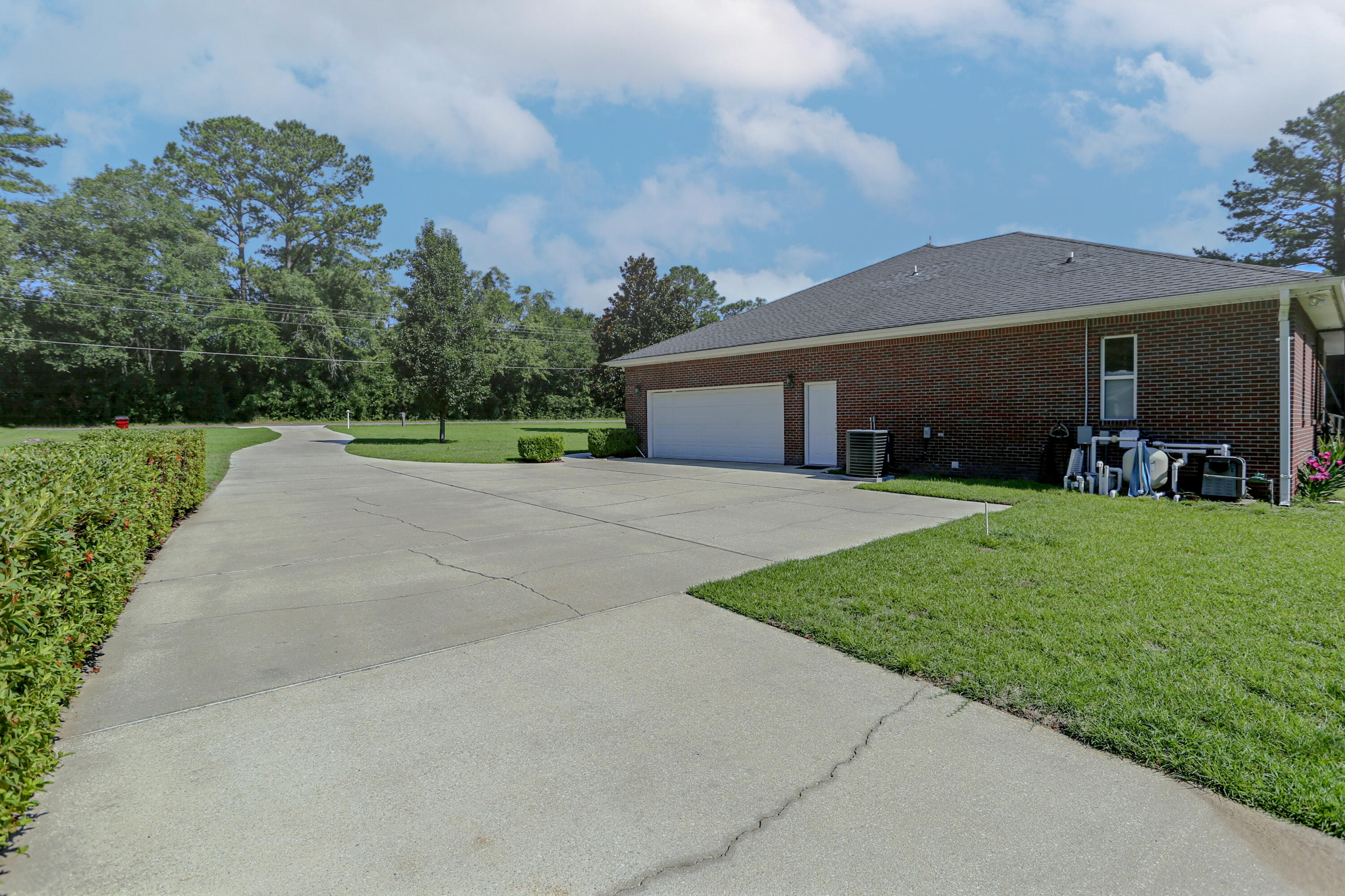 5467 Old River Road Baker, FL 32531 - Photo 8 of 55 a view of a house with a yard