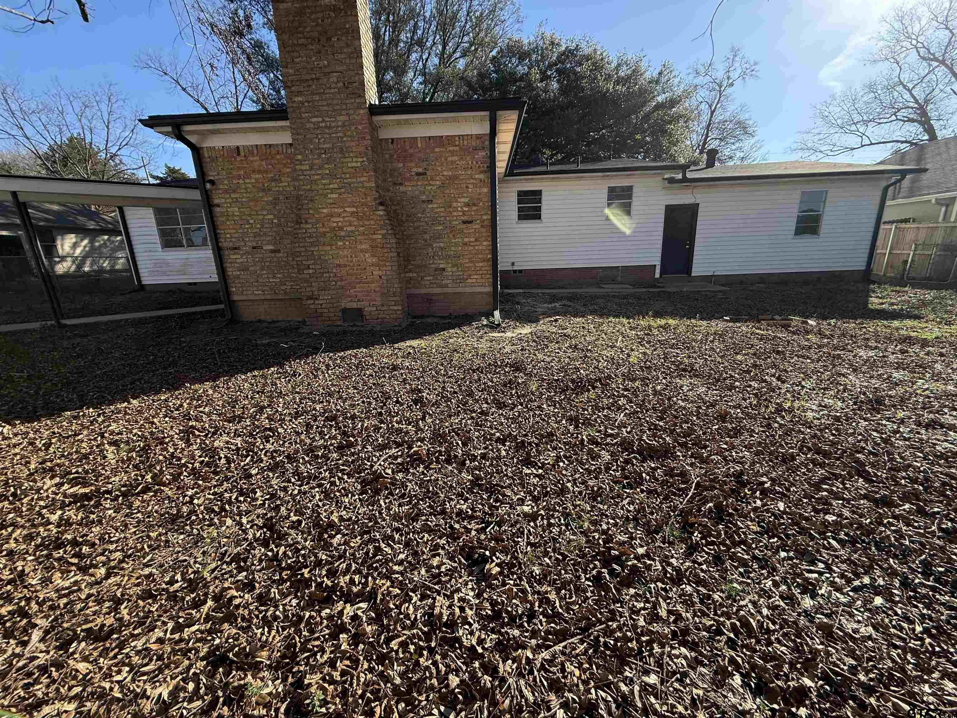 207 South Sun Camp Road White Oak, TX 75693 - Photo 15 of 18 a front view of a house with a yard