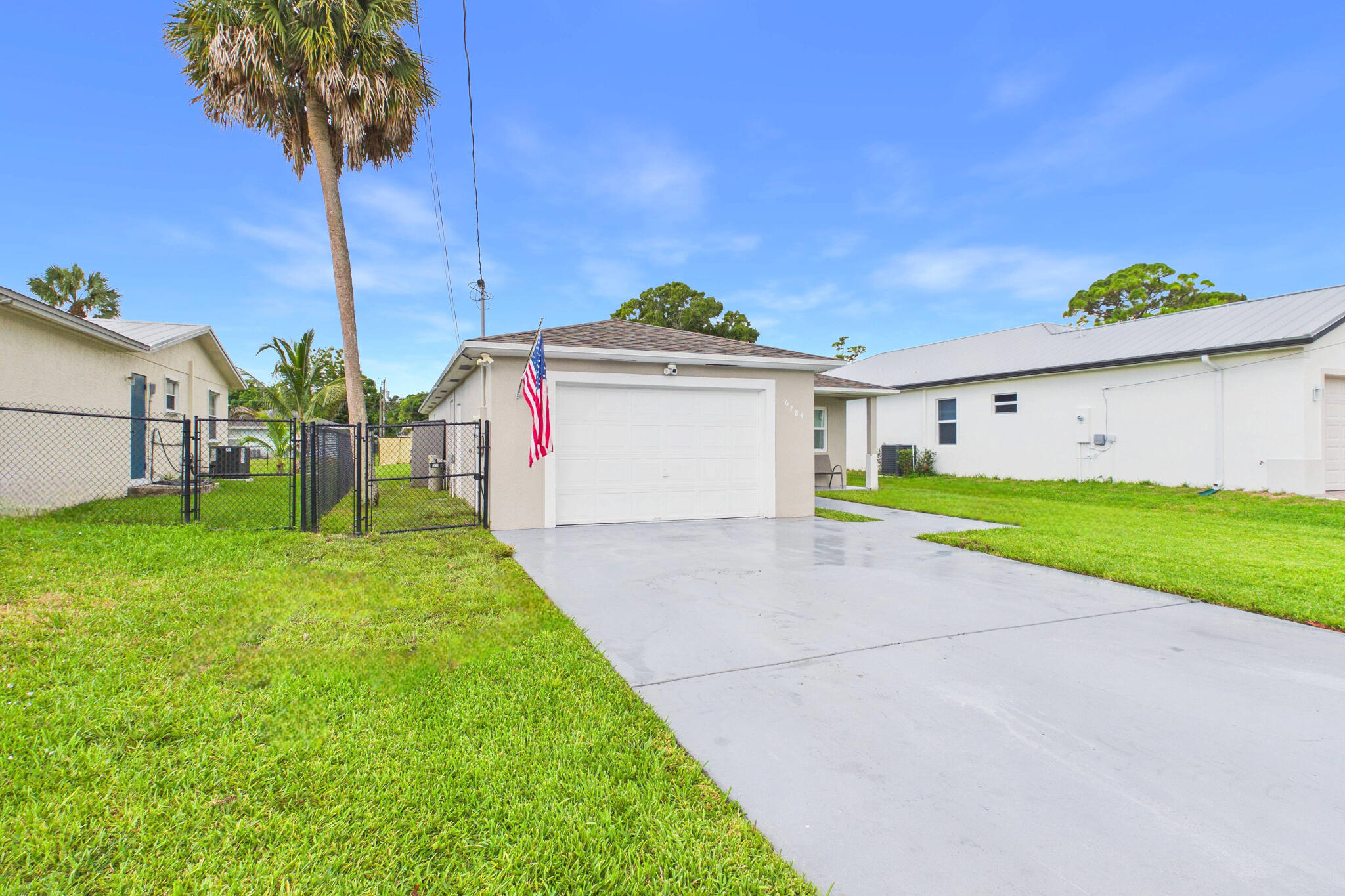 6784 3rd Street Jupiter, FL 33458 - Photo 3 of 70 EXTERIOR_FRONT_7