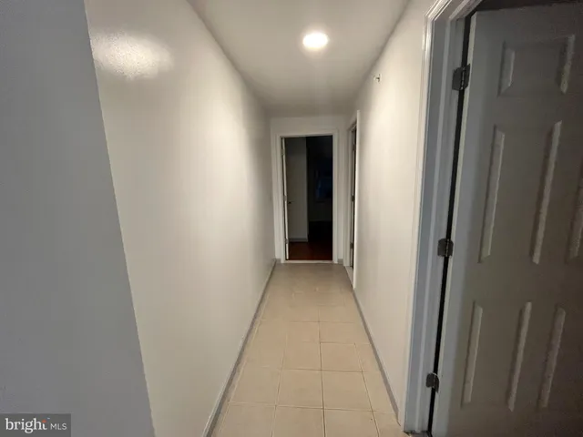 a view of hallway with stairs