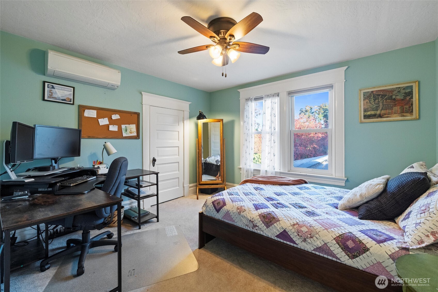 705 Pearson Street Walla Walla, WA 99362 - Photo 23 of 39 a bedroom with a bed and a desk
