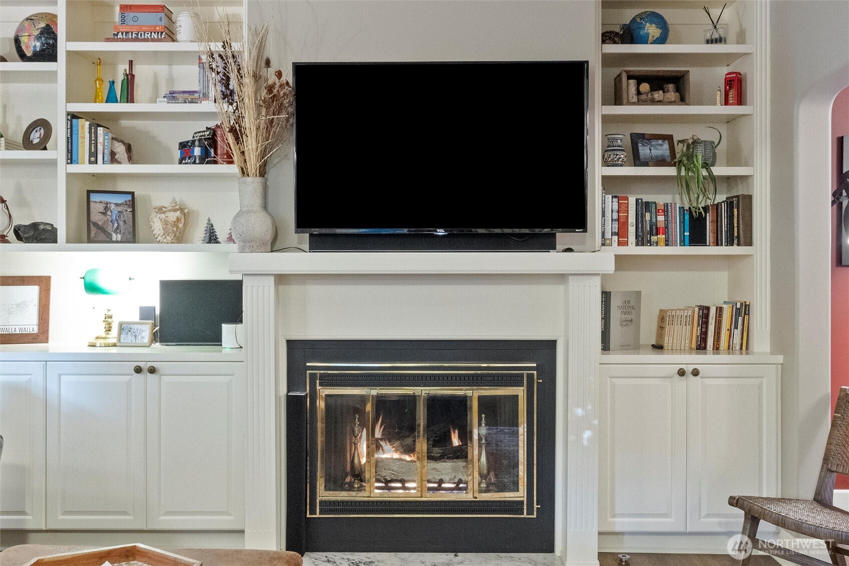 705 Pearson Street Walla Walla, WA 99362 - Photo 6 of 39 a living room with a flat screen tv and a fireplace