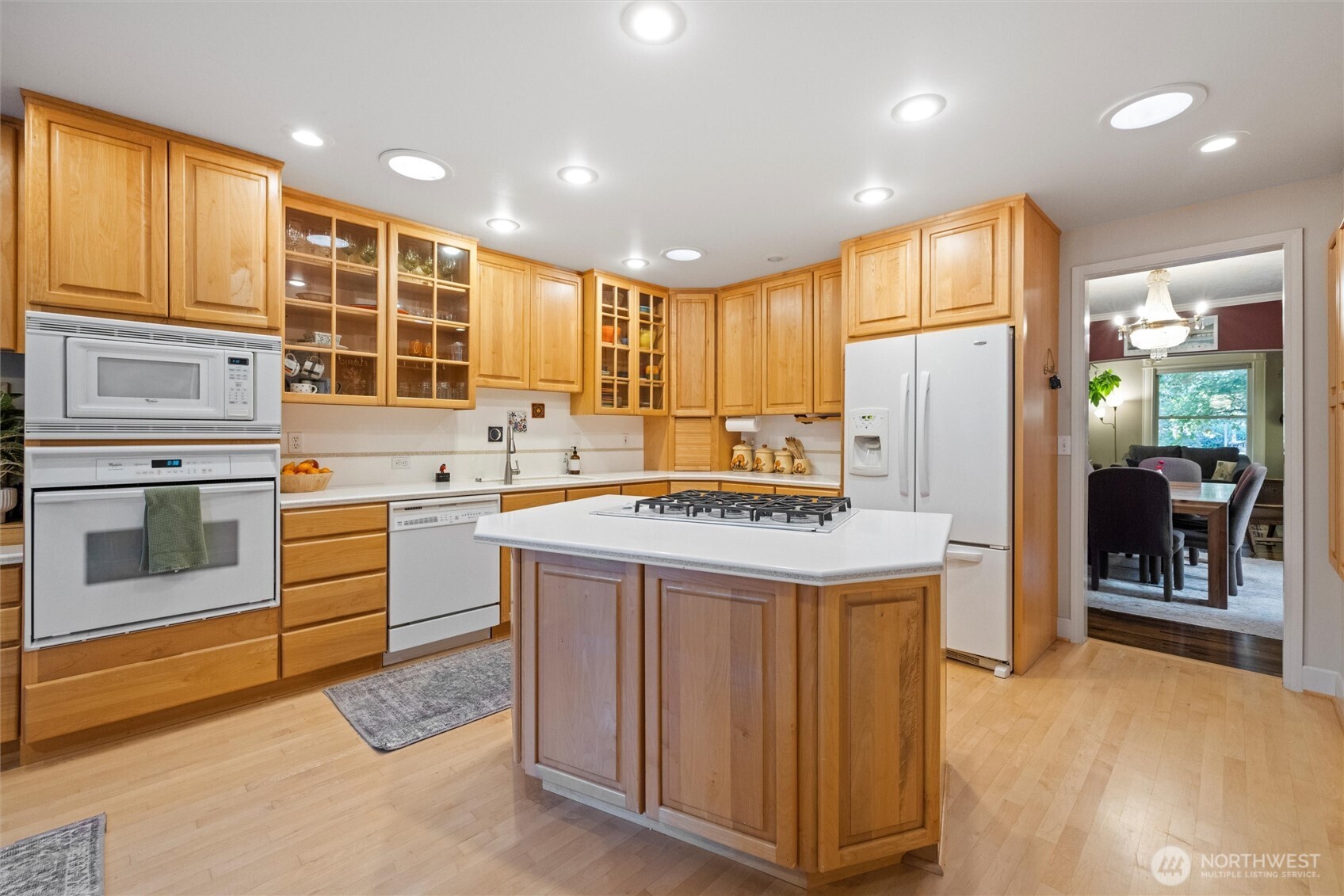 705 Pearson Street Walla Walla, WA 99362 - Photo 10 of 39 a kitchen with a stove a refrigerator and a sink