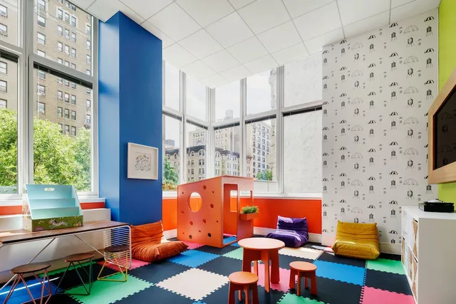 a room with furniture and a window