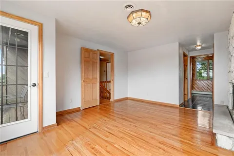 a view of a hallway with washer and dryer