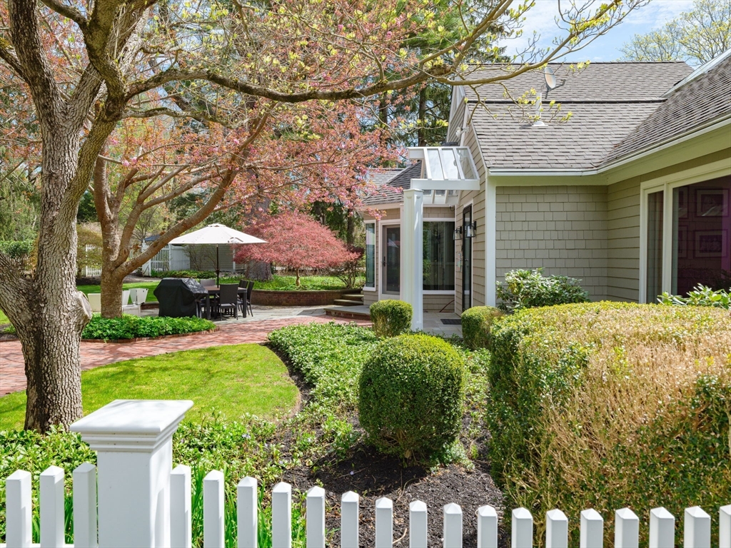 17 Cushing Street Hingham, MA 02043 - Photo 11 of 41 a front view of house with yard and green space
