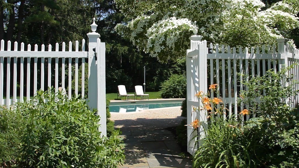 17 Cushing Street Hingham, MA 02043 - Photo 12 of 41 a view of a garden with a bench