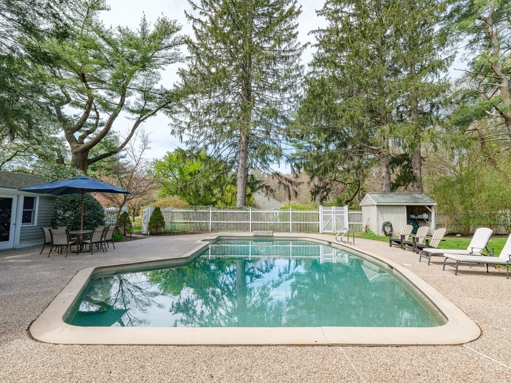 17 Cushing Street Hingham, MA 02043 - Photo 13 of 41 a view of a house with backyard swimming pool and sitting area