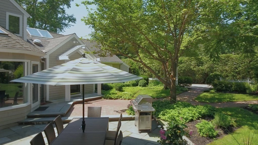 17 Cushing Street Hingham, MA 02043 - Photo 15 of 41 a view of a house with backyard and sitting area