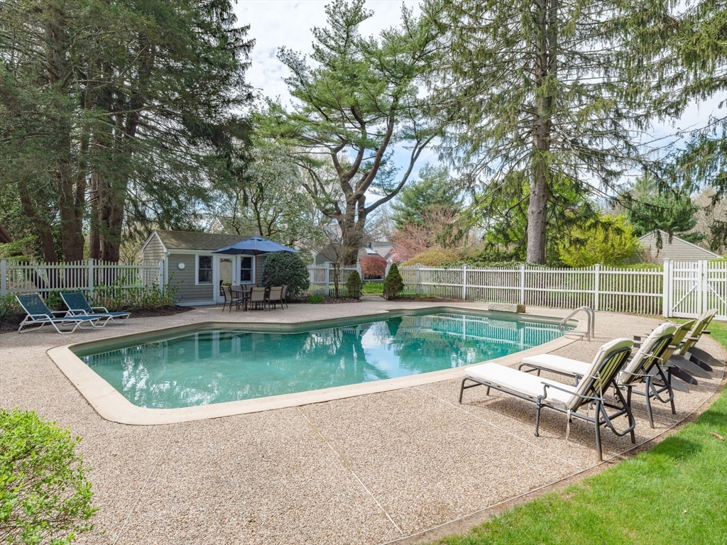 17 Cushing Street Hingham, MA 02043 - Photo 17 of 41 a view of a house with backyard and sitting area