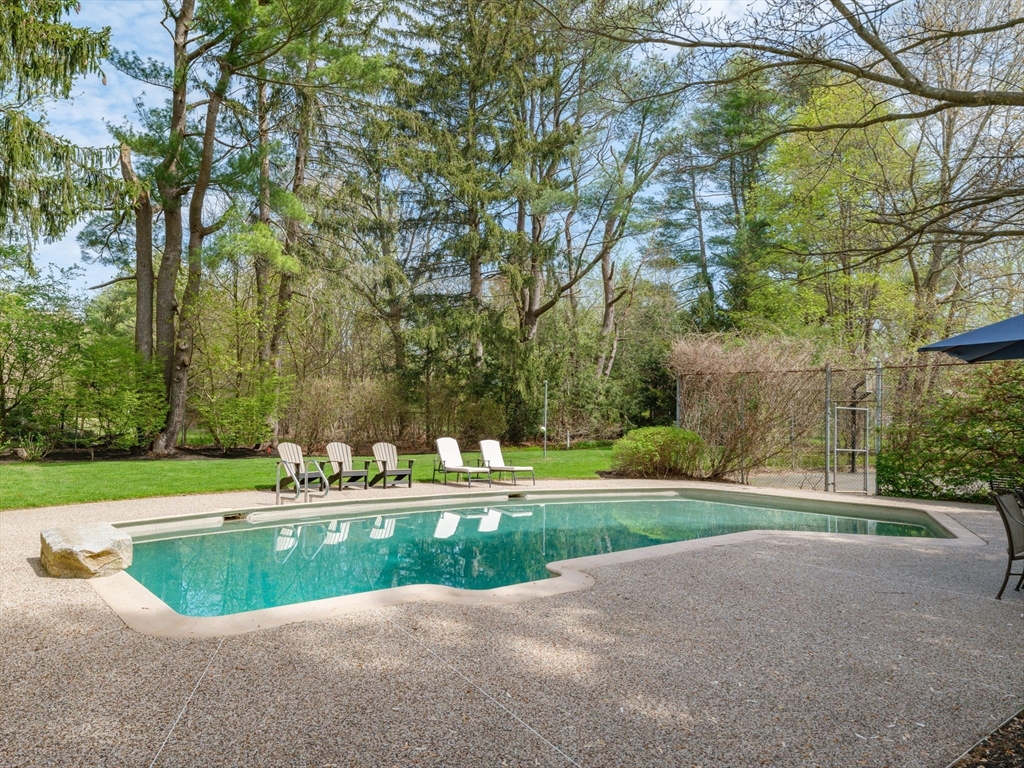 17 Cushing Street Hingham, MA 02043 - Photo 18 of 41 a view of a swimming pool with a yard