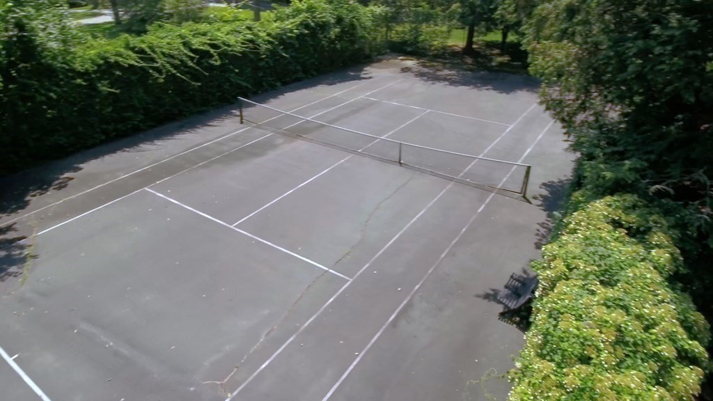 17 Cushing Street Hingham, MA 02043 - Photo 20 of 41 a view of a backyard with plants and large trees