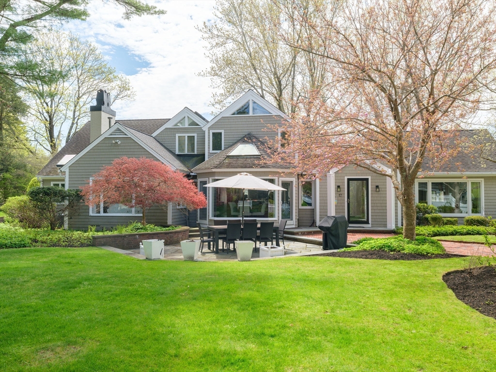 17 Cushing Street Hingham, MA 02043 - Photo 21 of 41 a front view of building with yard and outdoor seating
