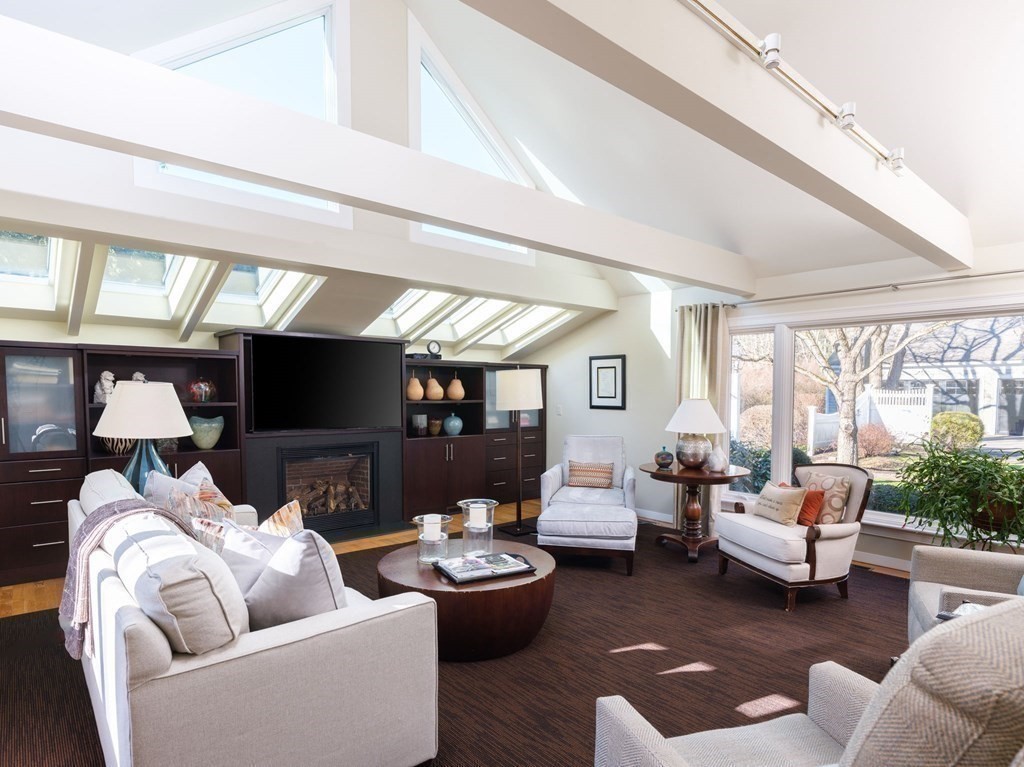 17 Cushing Street Hingham, MA 02043 - Photo 25 of 41 a living room with furniture and a flat screen tv