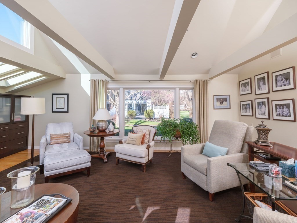 17 Cushing Street Hingham, MA 02043 - Photo 26 of 41 a living room with furniture and a large window
