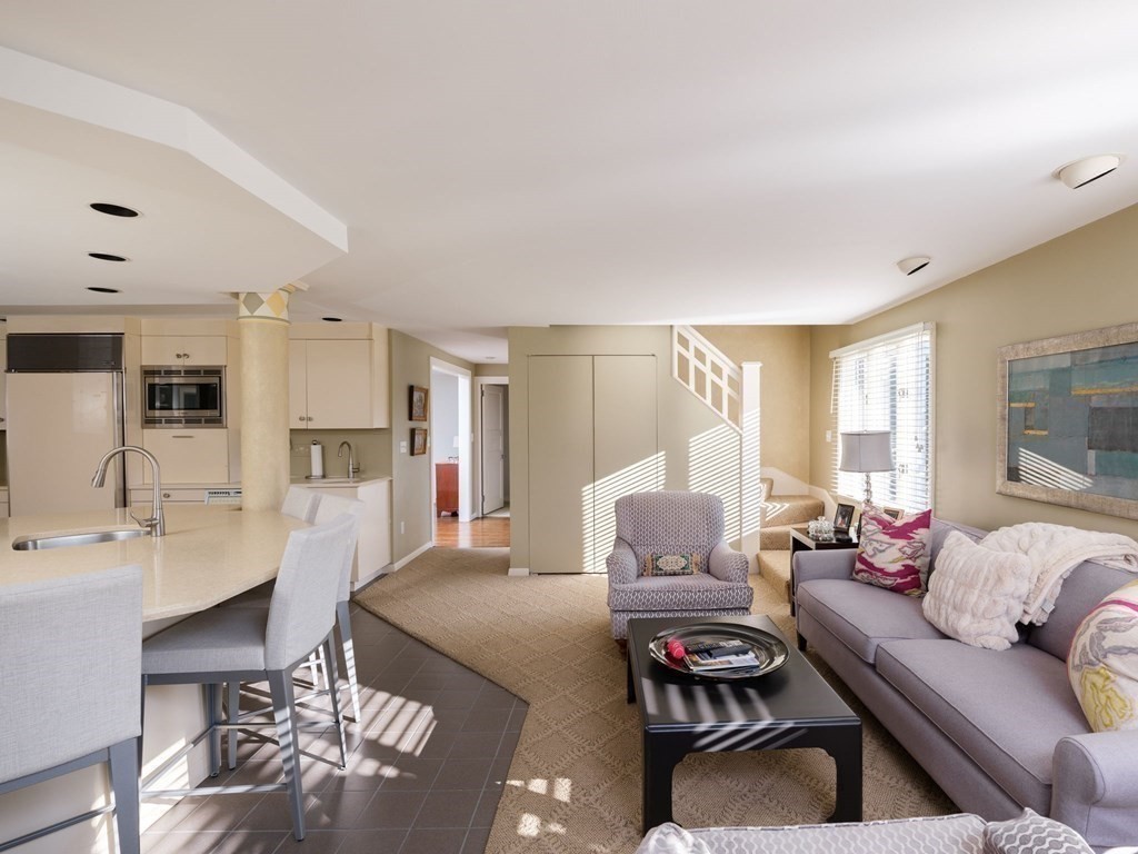 17 Cushing Street Hingham, MA 02043 - Photo 28 of 41 a bedroom with furniture and a wooden floor