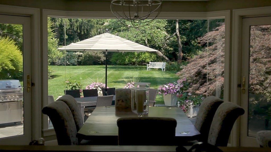 17 Cushing Street Hingham, MA 02043 - Photo 31 of 41 a view of backyard with seating space and hardwood floor