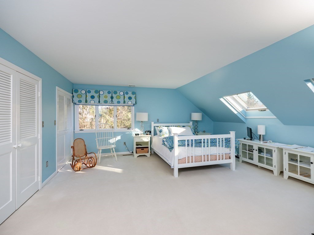 17 Cushing Street Hingham, MA 02043 - Photo 38 of 41 a bed room with furniture and a window